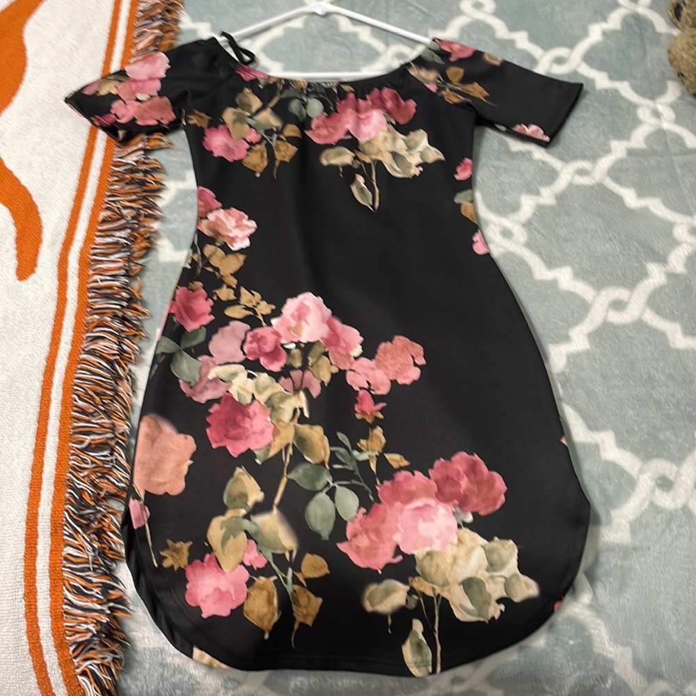 SMALL dress for sell. The polyester material is able to stretch as well.